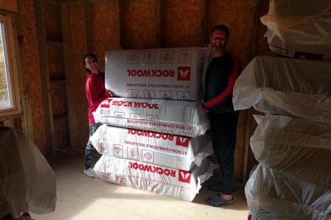 Unloading a lorry load of insulation